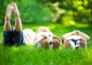 People lying in grass